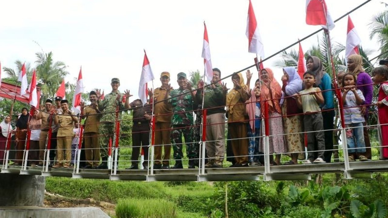 Jembatan Garuda TNI Dongkrak Ekonomi Warga Baros, Permudah Aksesibilitas